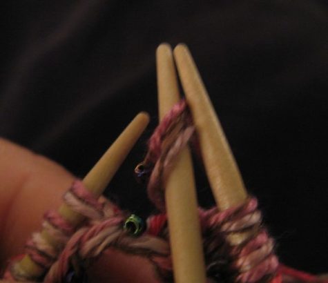 Make the needles parallel.