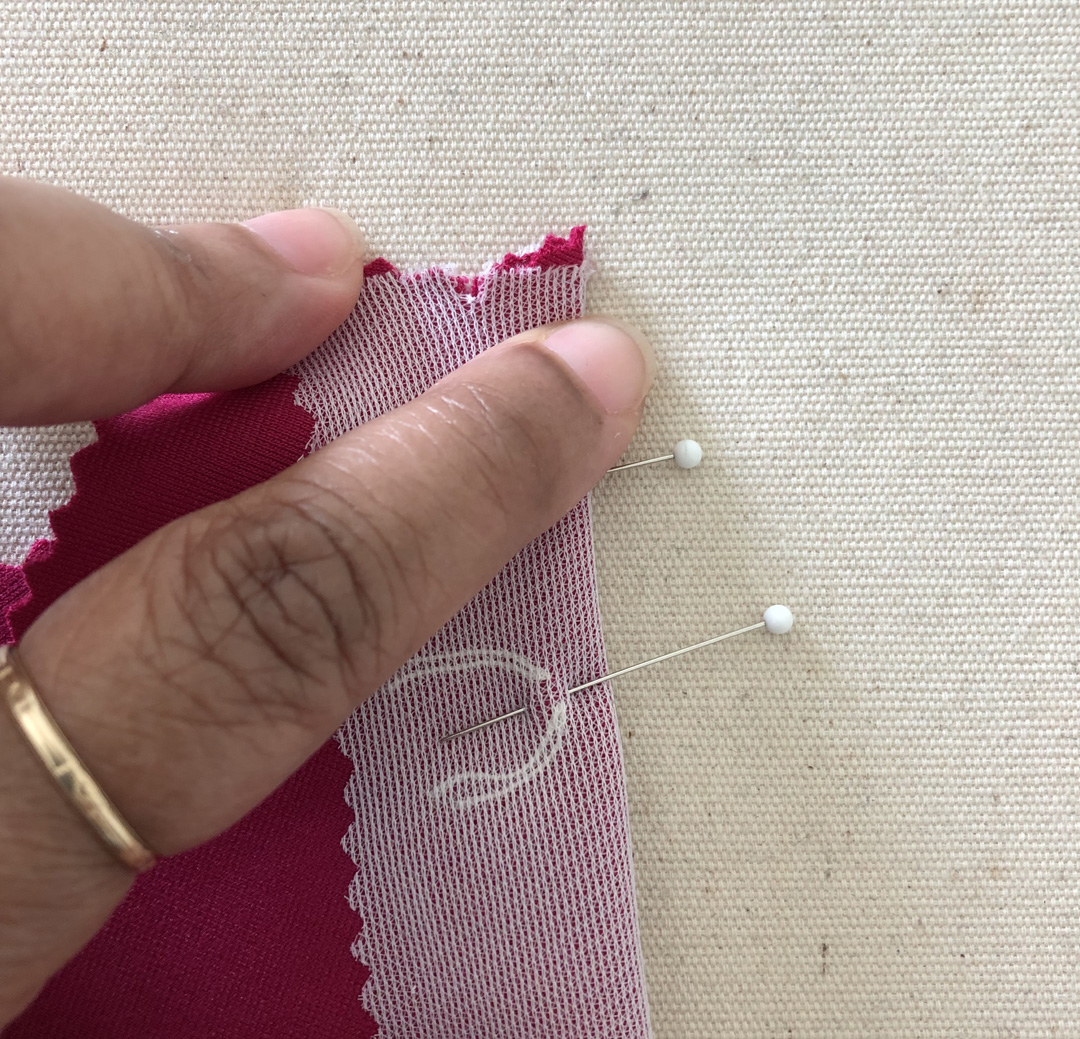 Make a clip at the large end of the dart (on each side) to indicate where to start sewing.