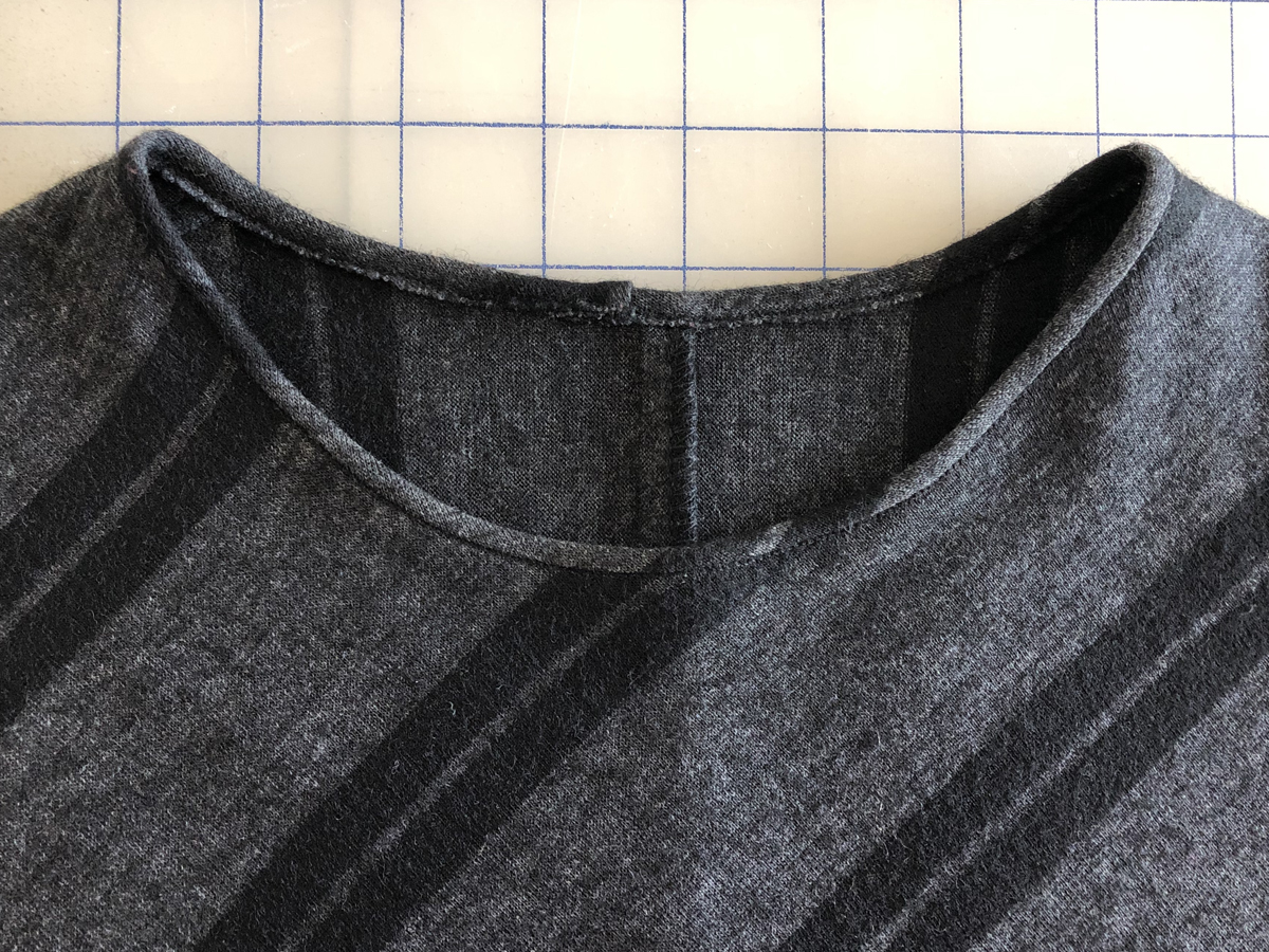 Knit top with neck binding