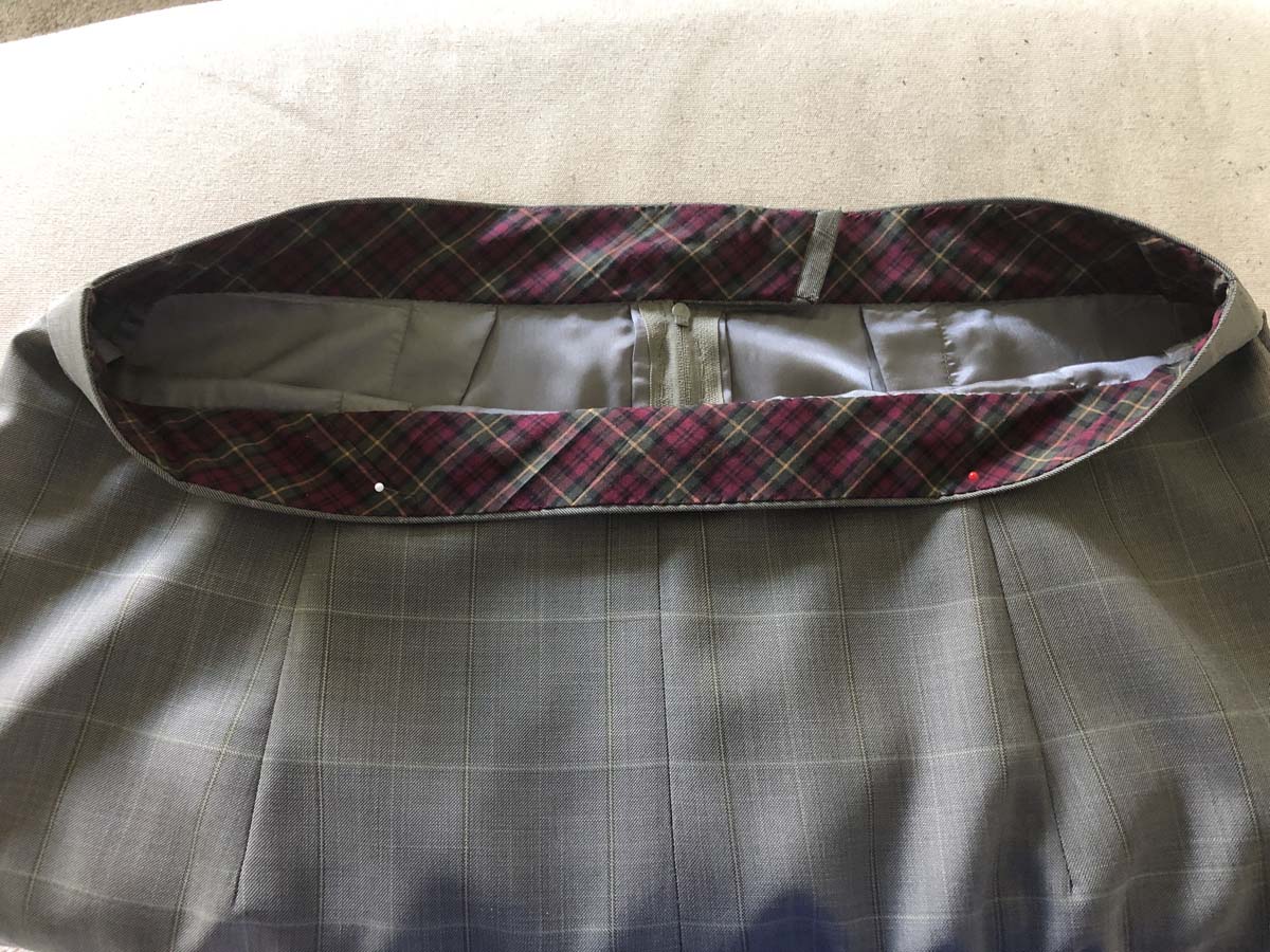View of finished inner waistband featuring the bias strips cut from the plaid shirt