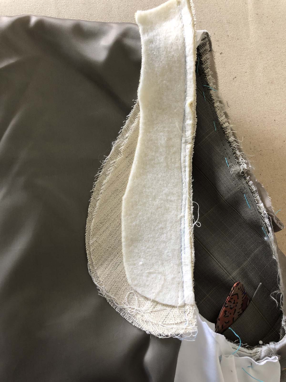 Sleeve heads used to pad the jacket back