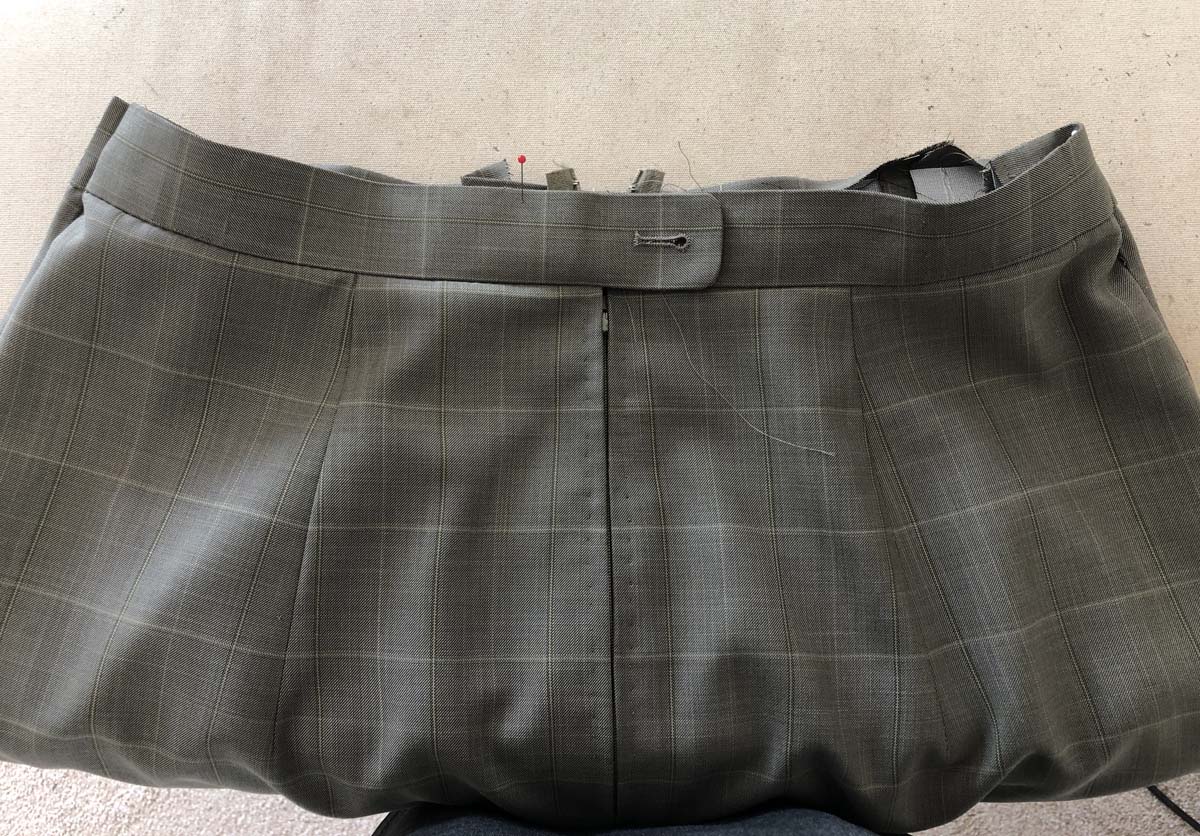 Skirt waistband with hand-picked zipper created from men's suit pants