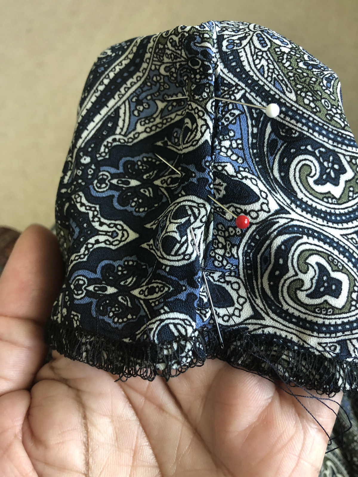 Hand-sew to close the blouse's continuous laps