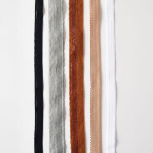 Thinner and lacy elastic with a silicone backing keeps garments from slipping