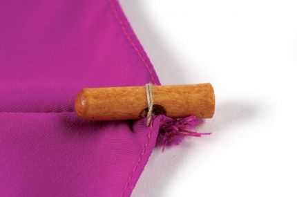 Sew the tips to the canopy’s seam hems.