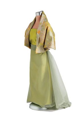 collection of fabrics on dress form