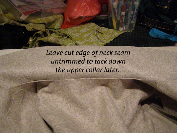 leave cut edge of neck seam untrimmed to tack down the upper collar later