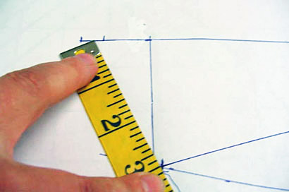 Pivot from the collar line and measure 3 inches
