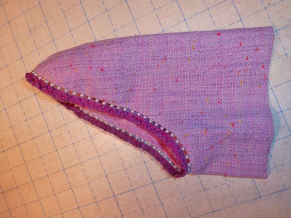 finished sleeve with pearl and chiffon detail