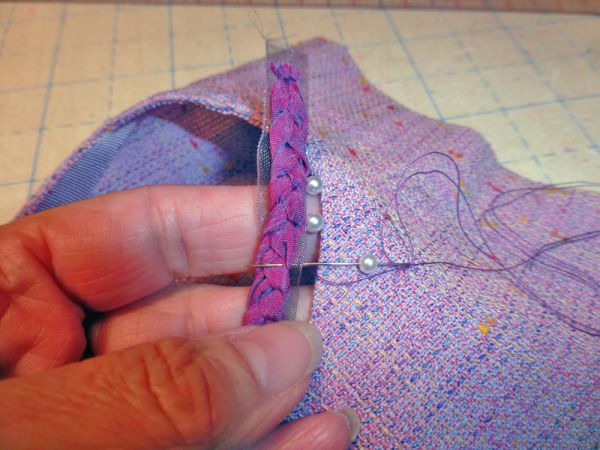 add the braided embellishments to sleeve
